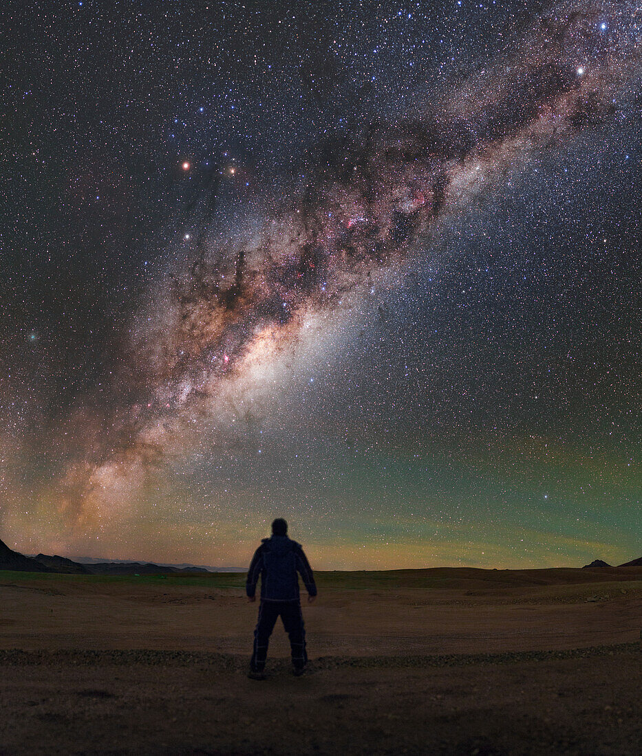 Man staring at night sky, Atacama Desert, Chile