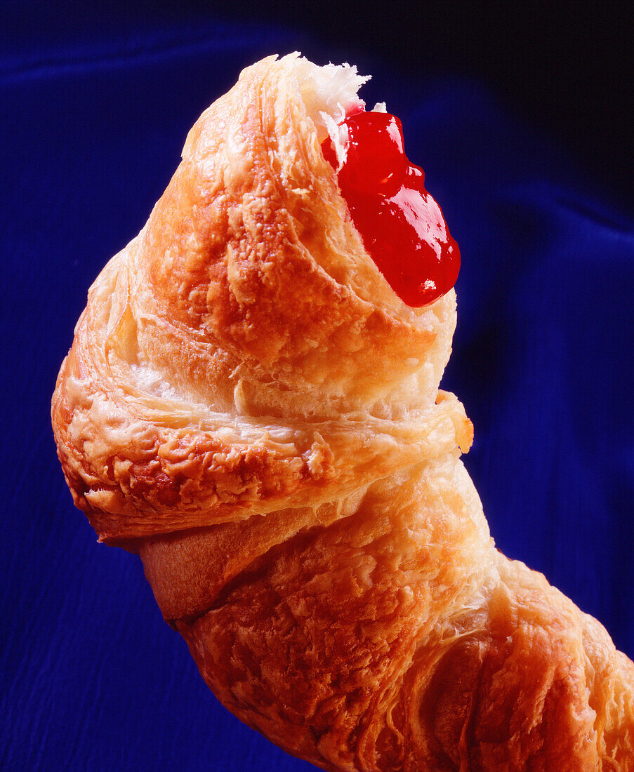 Croissant with strawberry jam