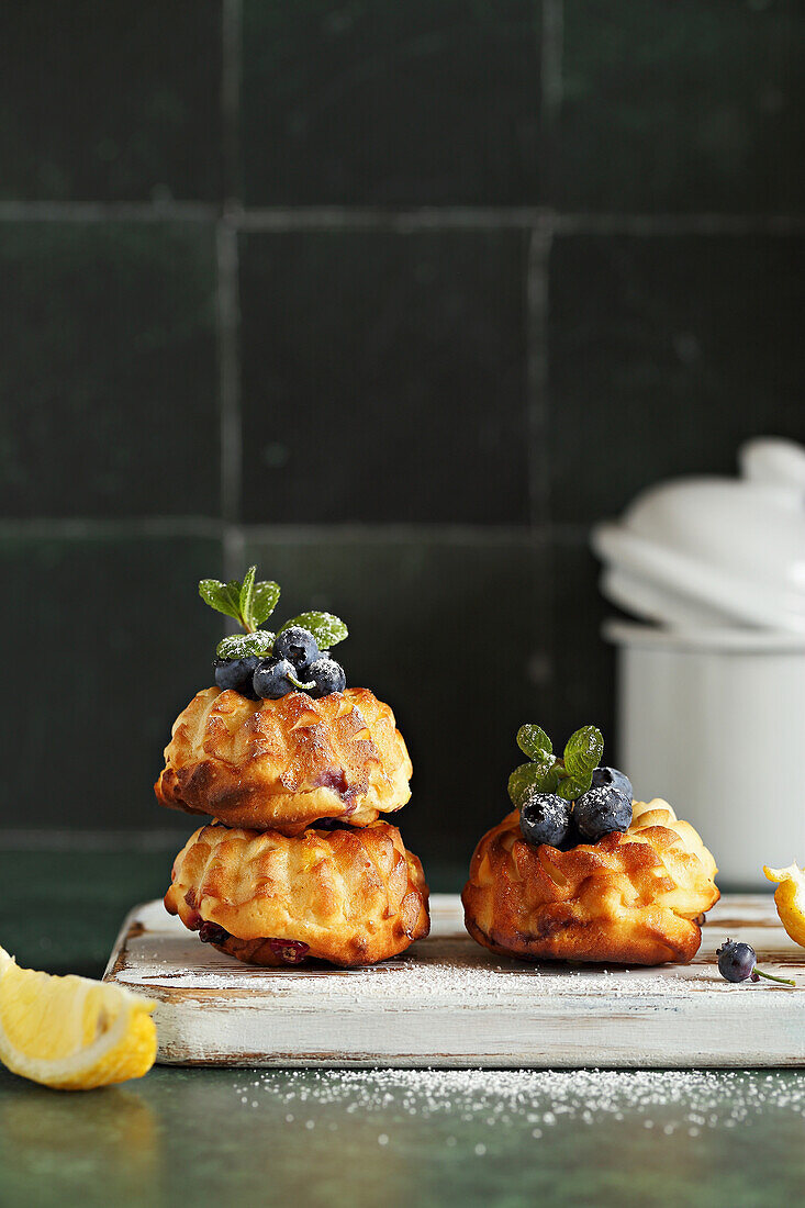 Mini lemon bundt cake with ricotta and blueberries baked in a hot air fryer