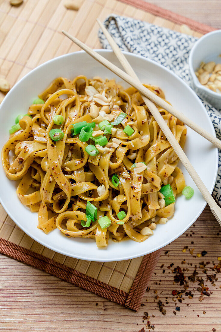 Tagliatelle Dandan Style with chili, Szechuan pepper, soy sauce and peanut butter