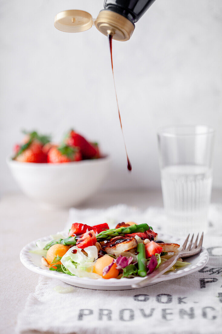 Summer salad with asparagus and strawberries