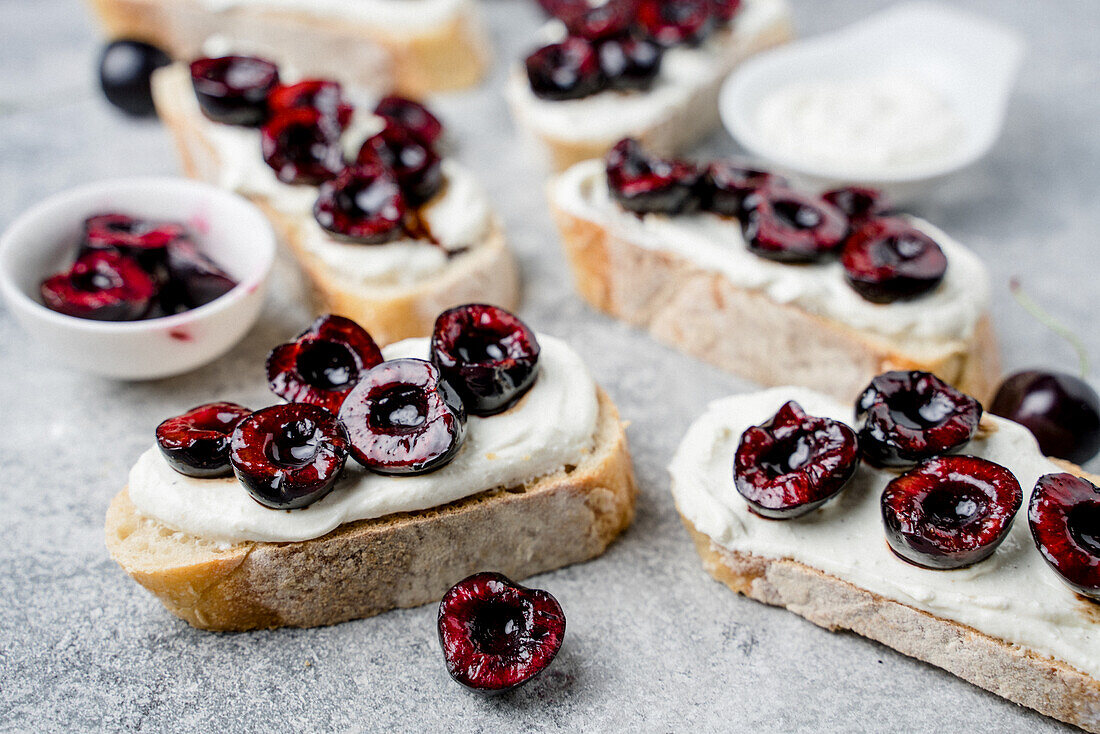 Bruschetta with balsamic cherries, ricotta and lemon