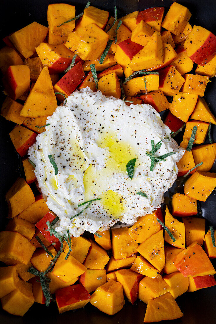 Baked pumpkin with ricotta, sage, and olive oil