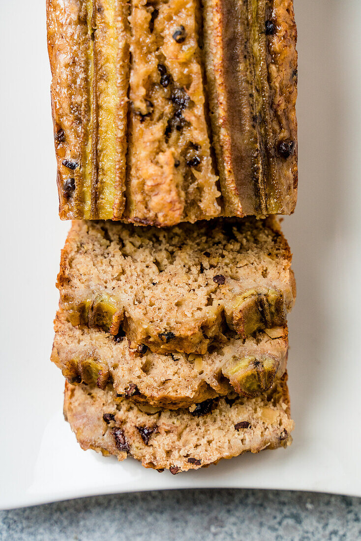Vegan banana bread with nuts, oat flakes, spelt flour and cocoa nibs