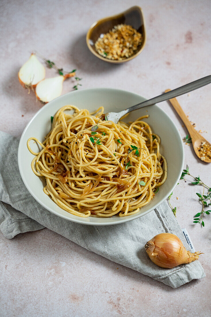 Pasta with braised miso onions with crunchy crumbs and thyme