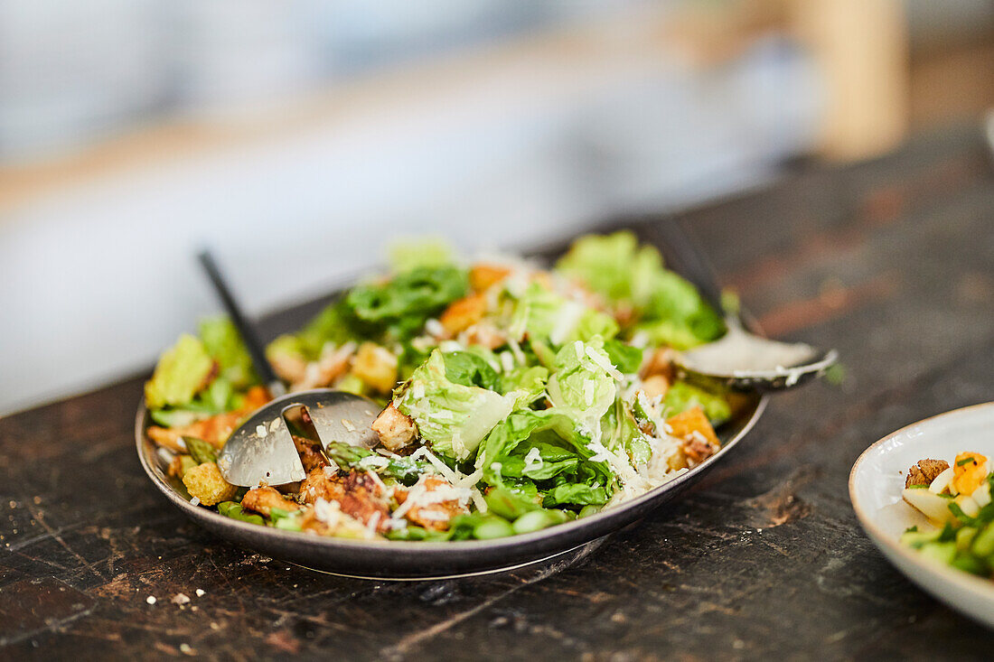 Cesar salad with green asparagus