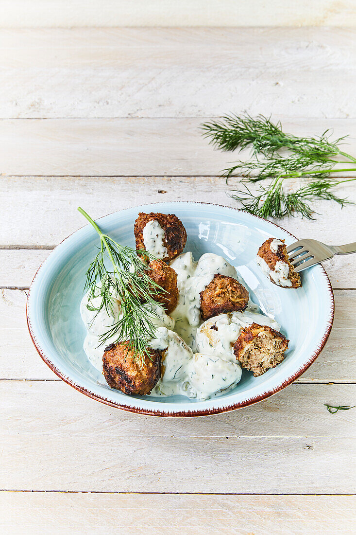 Potato salad with meatballs