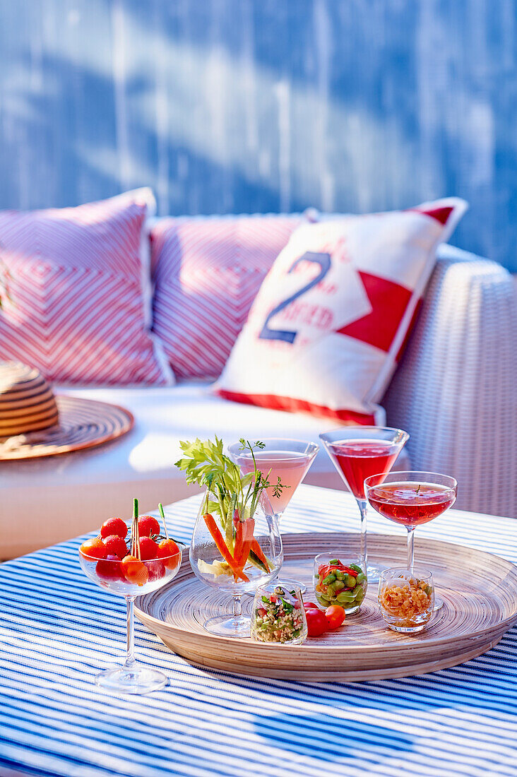 Vegetable, quinoa tabbouleh, and cocktails as an aperitif