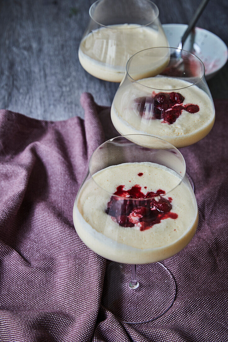 Red berry compote with custard