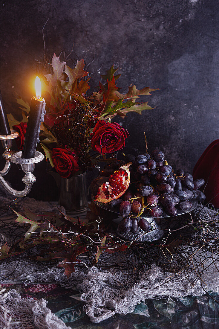 Halloween table decoration with burning candles