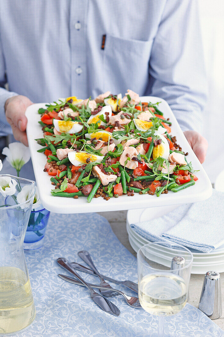 Puy lentil salad with salmon, green beans, egg, and olive dressing