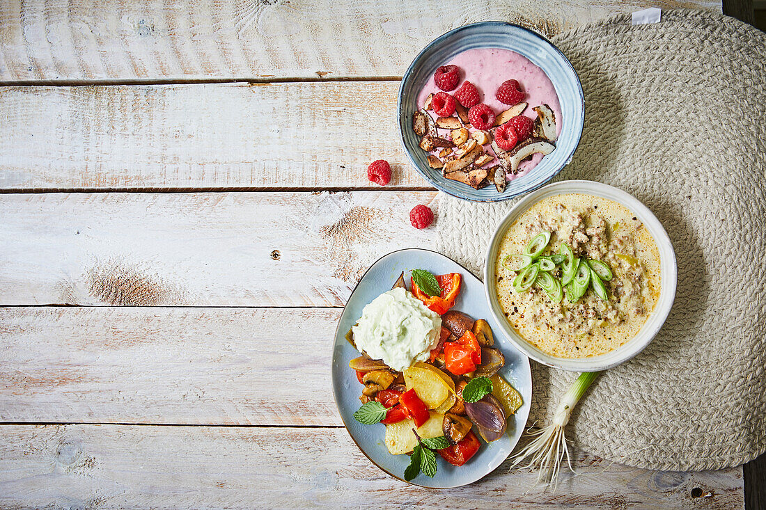 Leek soup with minced meat, roasted vegetables, raspberry smoothie bowl