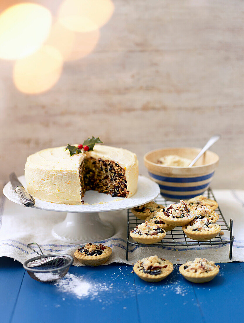 Fruitcake with apricot butter icing, mince pies with crunchy crumble toppings