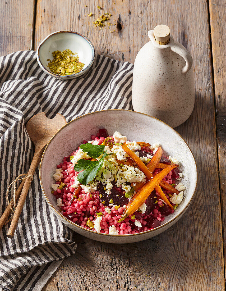 Pearl couscous with feta, beet and carrot