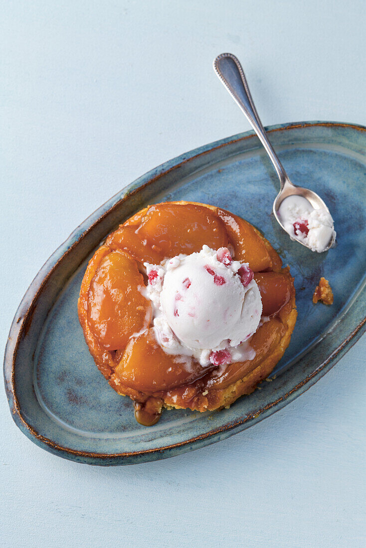 Macadamia sorbet with pomegranate on tarte tatin