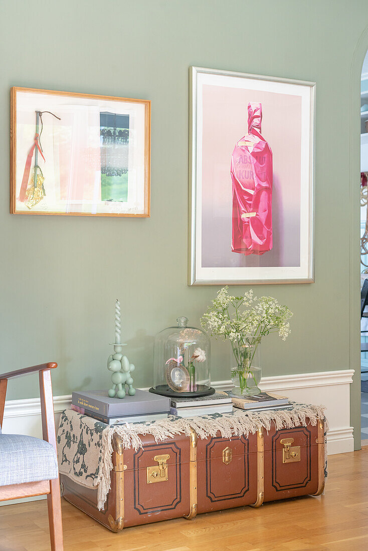 Vintage suitcase as console table, modern art and home accessories