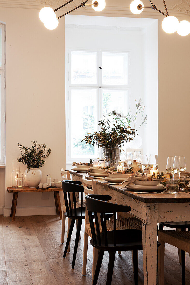 Scandinavian-style dining table with window view