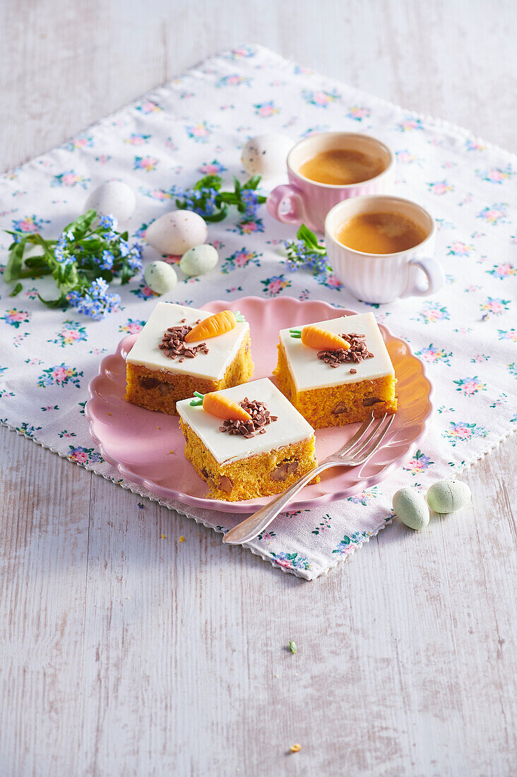 Carrot cake slices with white chocolate icing