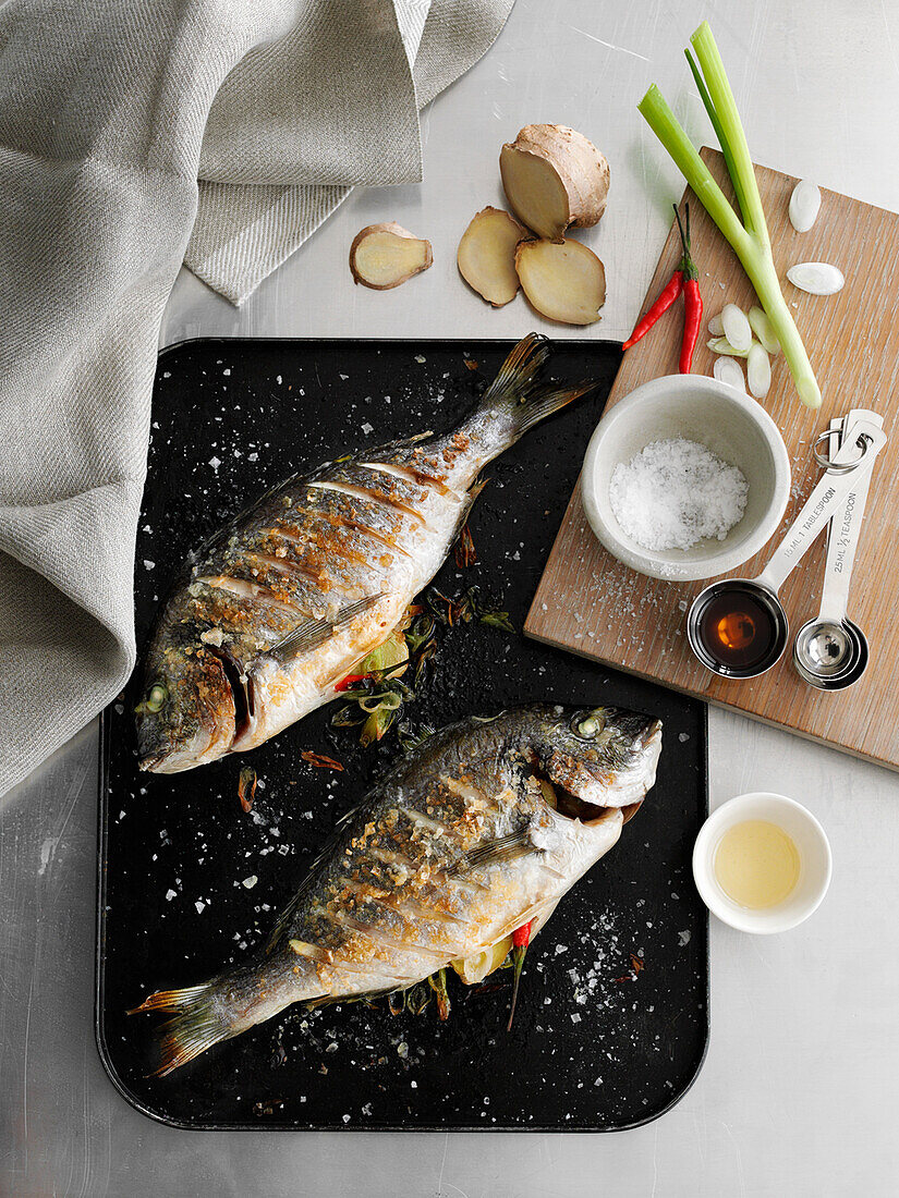 Crispy whole gilthead with ginger-chili stuffing