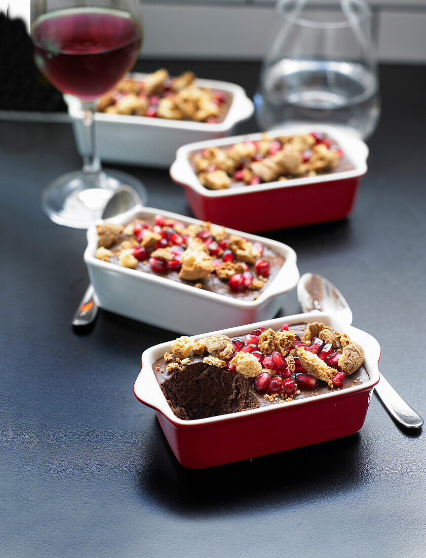 Baked chocolate pudding with pomegranate and amaretti