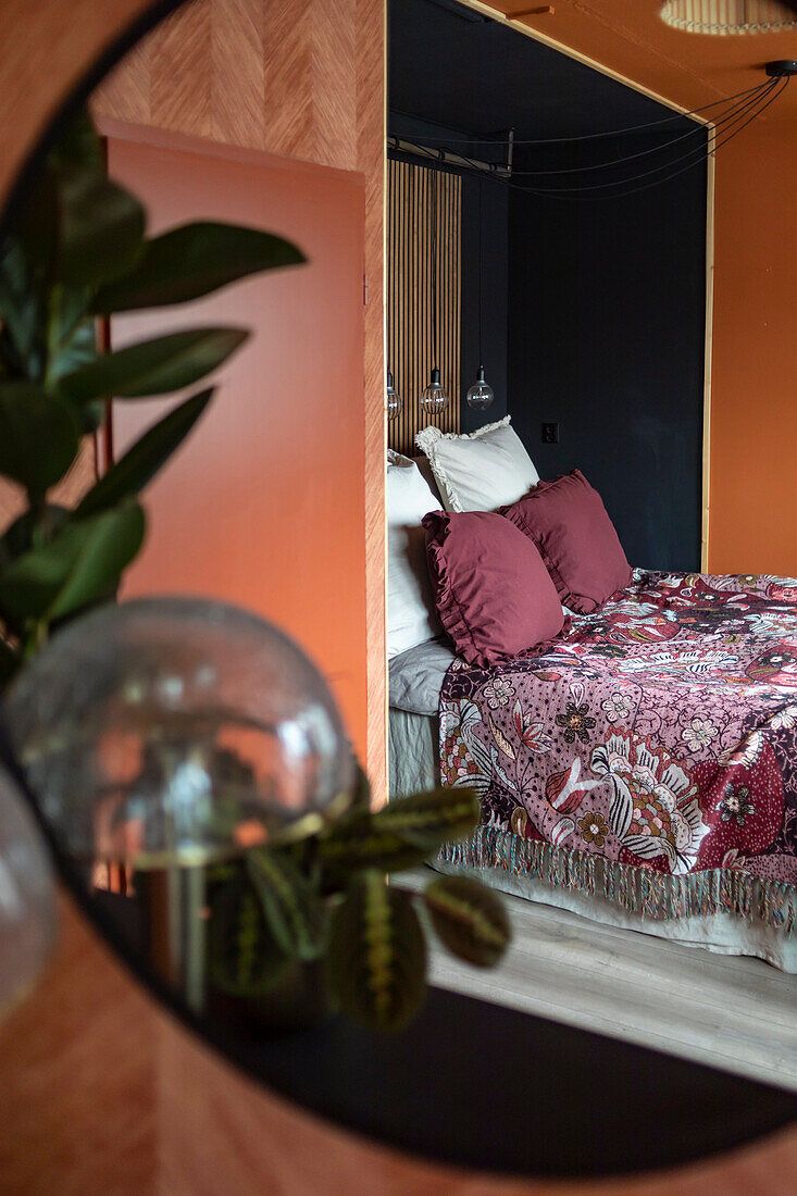 View of bedroom with patterned ceiling and contrasting walls