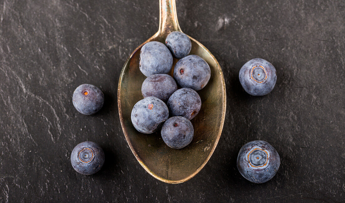 Blueberries on a silver spoon