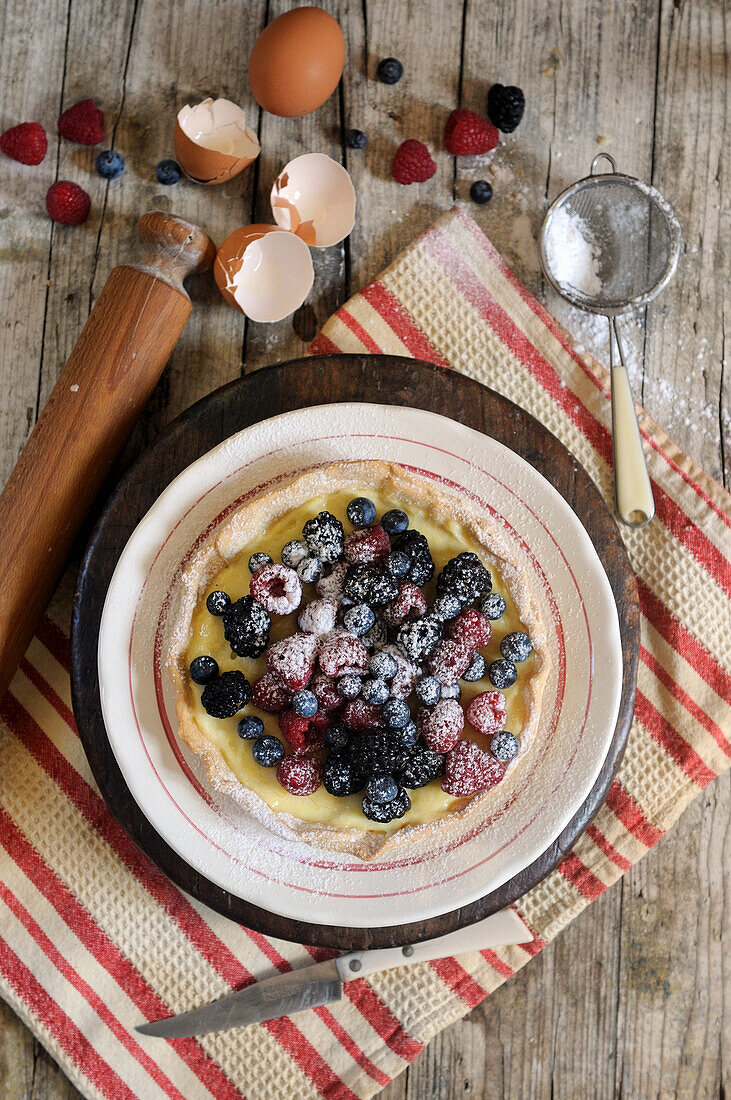 Italian cake with summer berries and cream