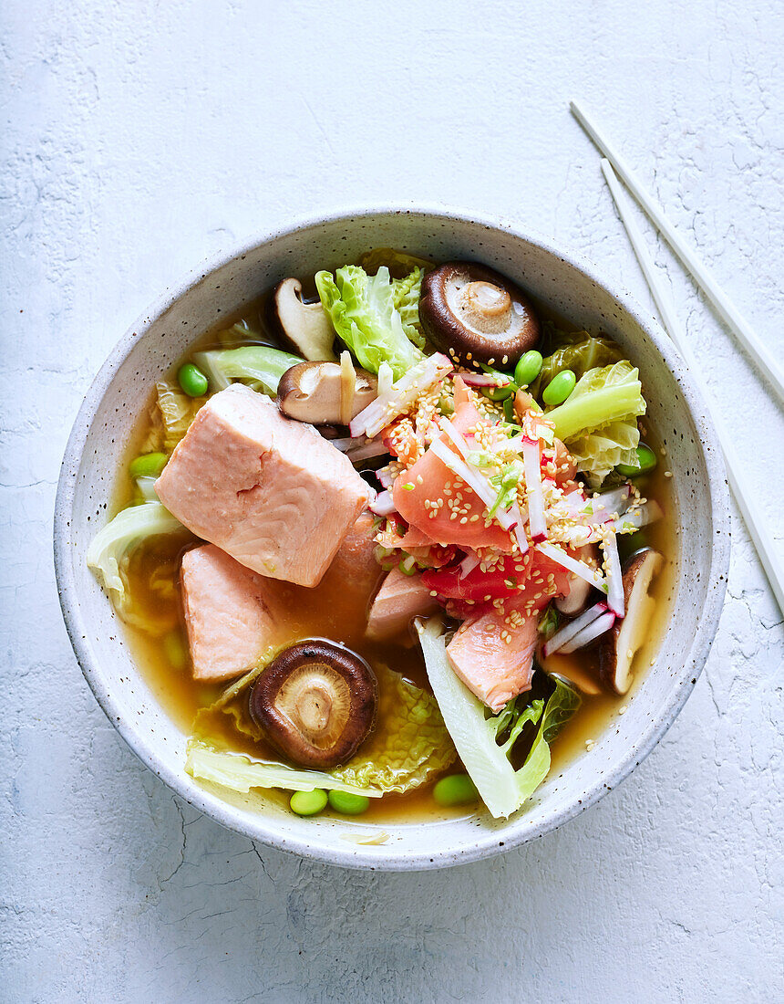 Steamed salmon and cabbage with asian broth
