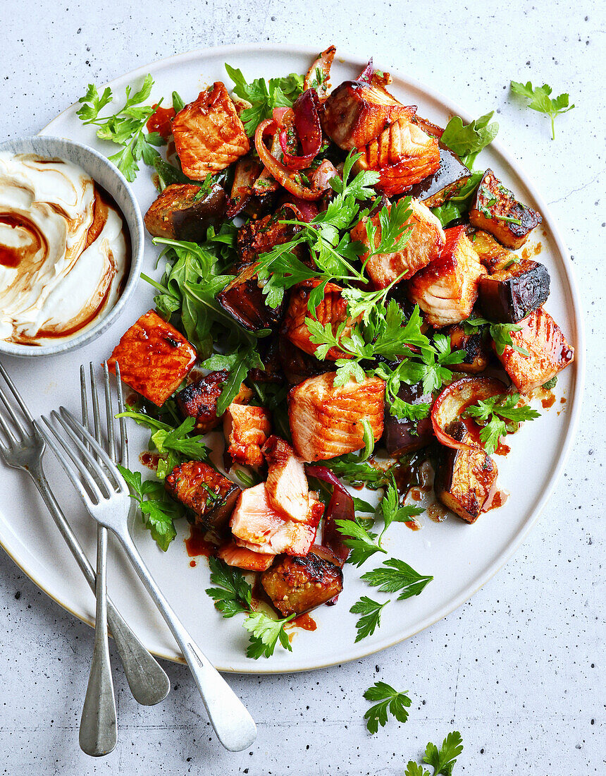 Sticky pomegranate salmon with eggplant