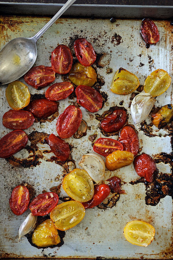 Roasted red and yellow tomatoes with garlic