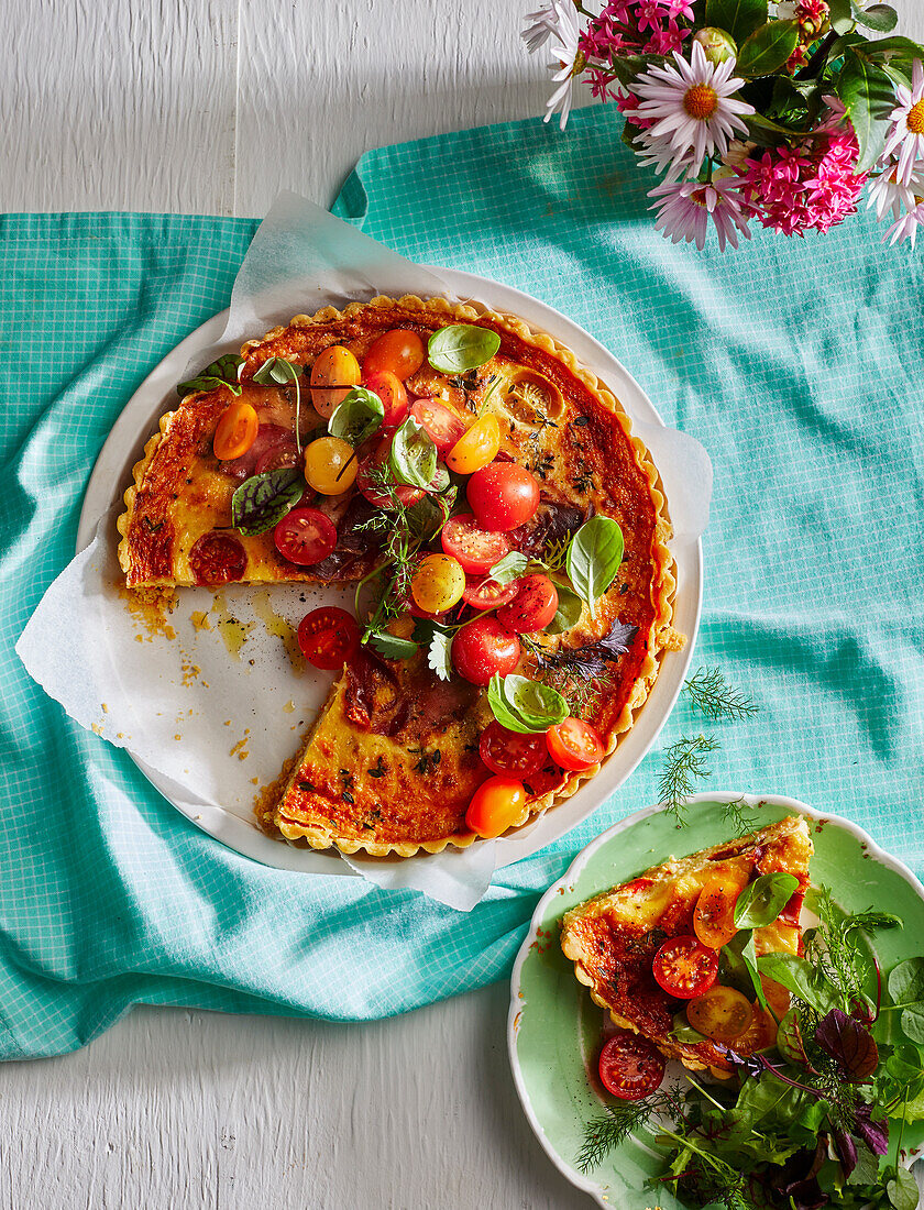 Quiche with colorful cocktail tomatoes