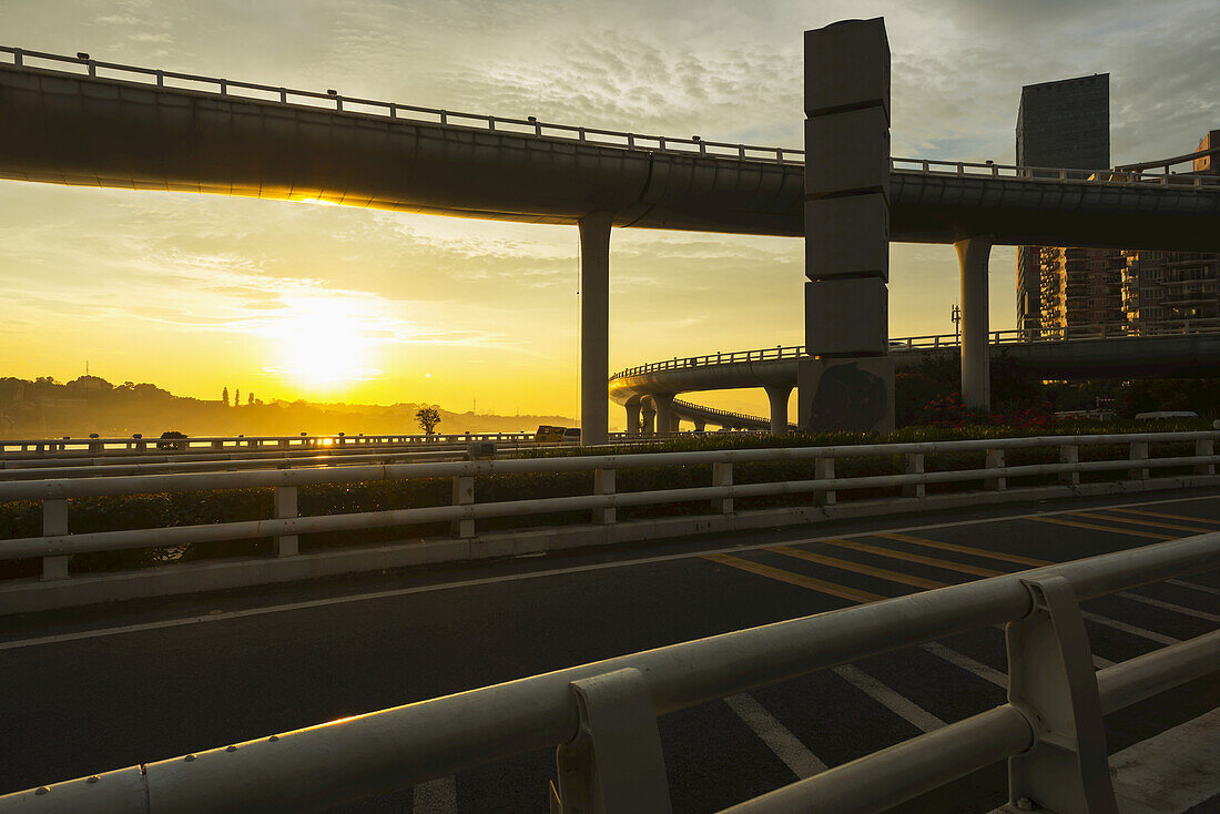 Highway From Xiamen City, China At Sunset, With Gulangyu Island In The Background; Xiamen, China