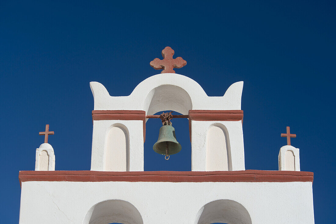 A Red And White Painted Bell Tower On A Church; Oia, Santorini, Cyclades, Greek Islands, Greece