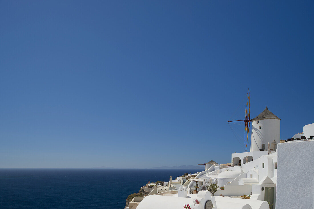 An Old Windmill Overlooking The Caldera; Oia, Santorini, Cyclades, Greek Islands, Greece