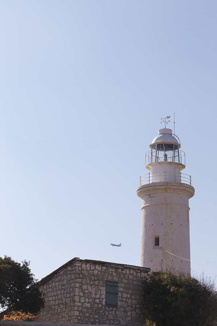 White Lighthouse Against A Blue Sky; Paphos, Cyprus