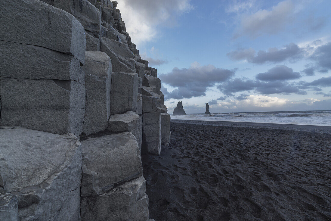 Columnar Rocks Line The Shore Along The South Coast Of Iceland Near Vik; Iceland