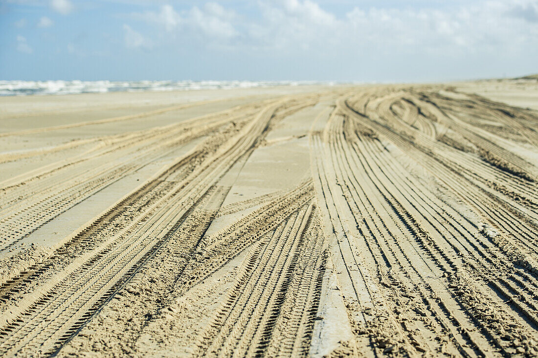 Tire Tracks In The Sand On Casino Beach, The Longest Beach In The World; Rio Grande Do Sul, Brazil