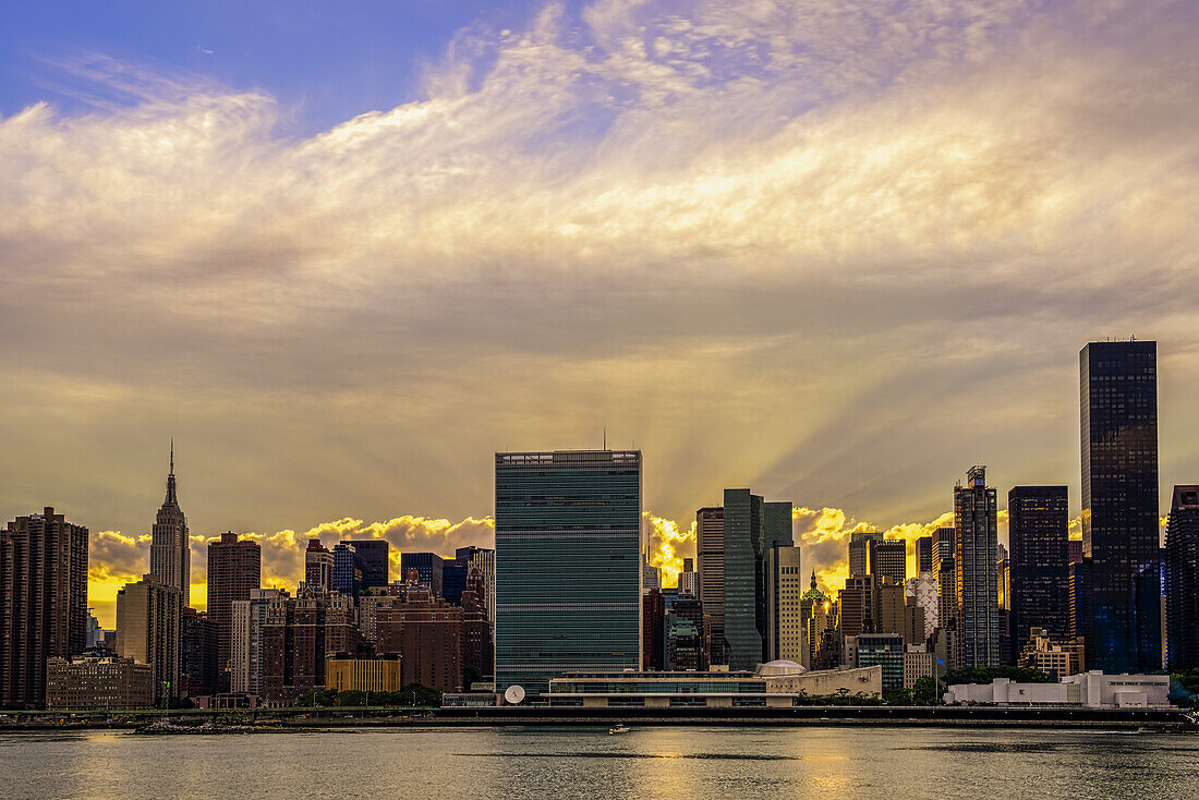 Sun Setting Behind United Nations; New York City, New York, United States Of America