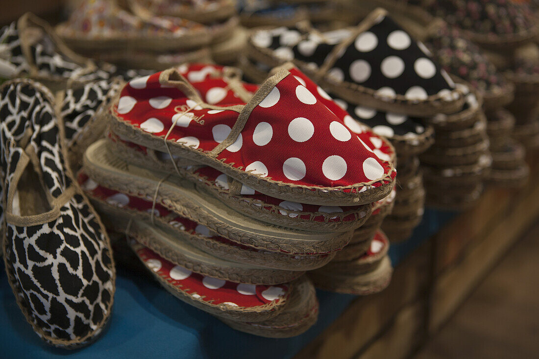 Polka Dot And Animal Pattern Espadrilles, A Modern Version Of Traditional Basque Form Of Footwear, For Sale In A Souvenir Shop; San Sebastian, Spain