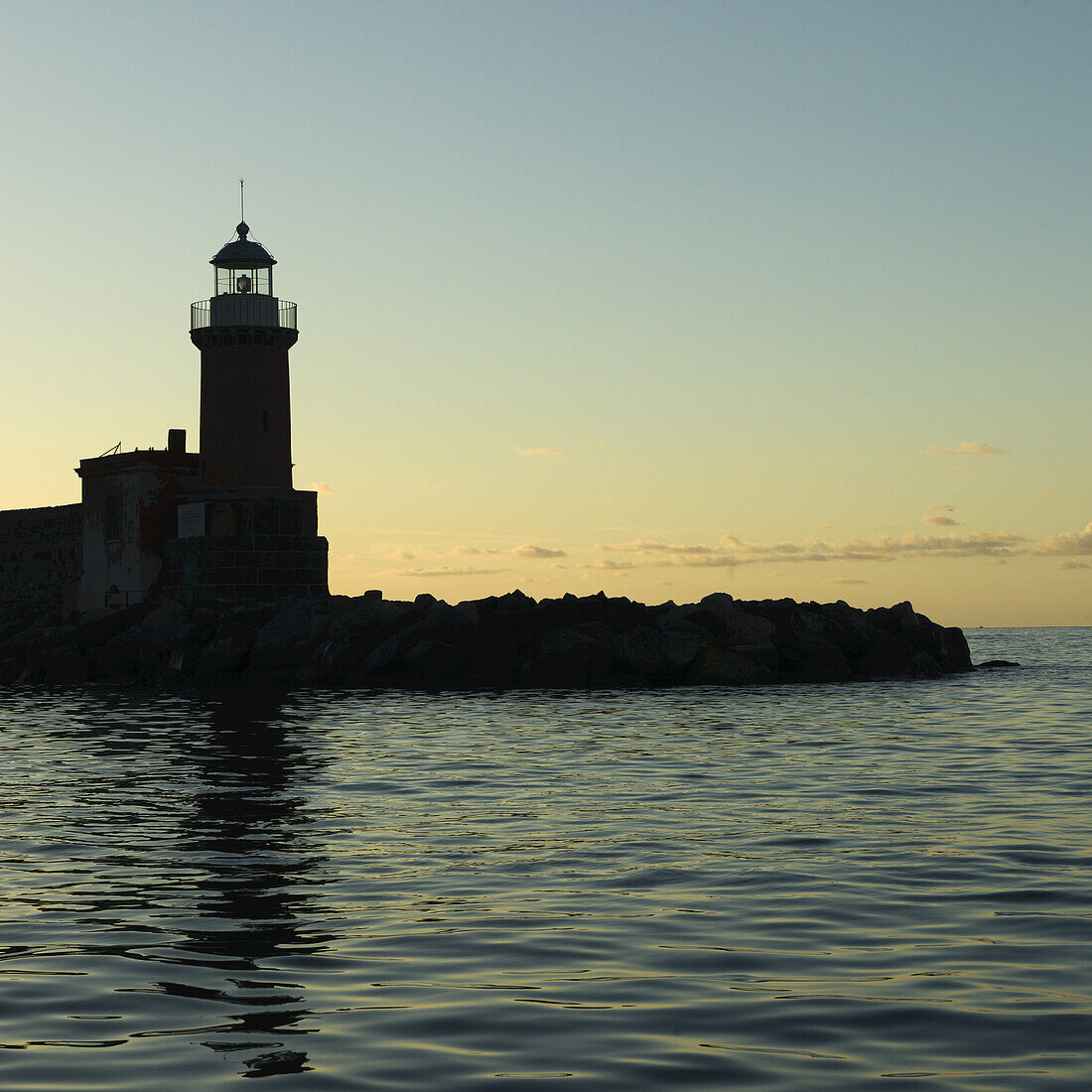 Silhouette Of A Lighthouse; Ischia, Italy