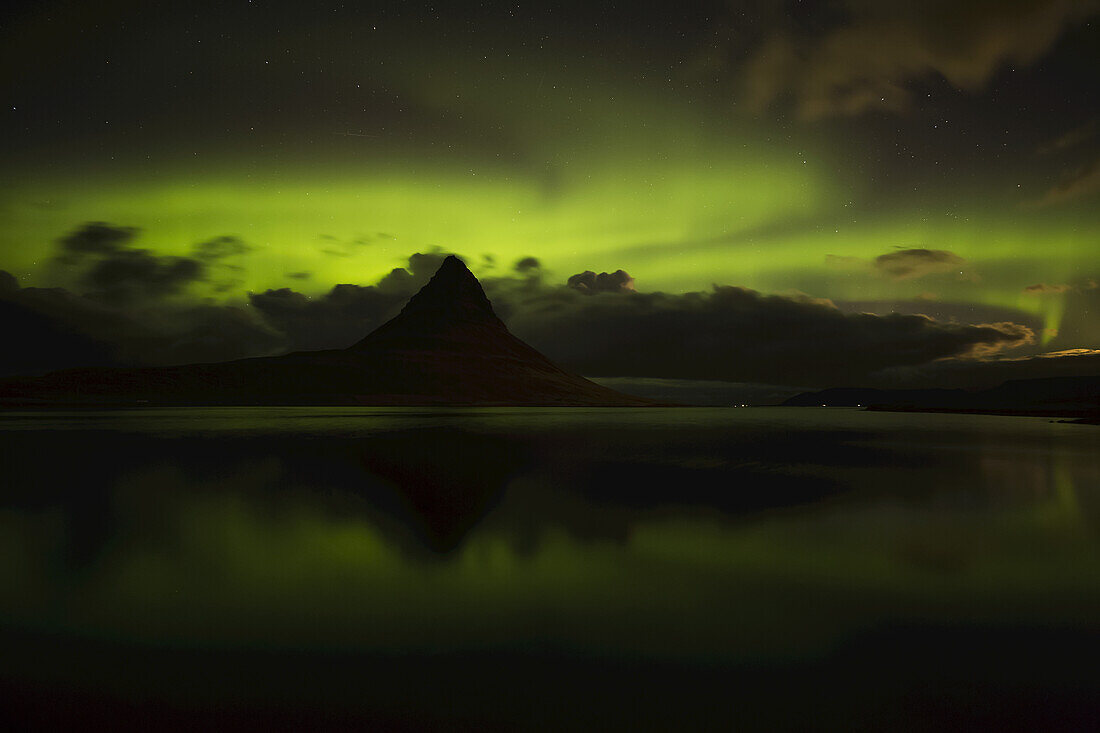Northern Lights Over Top Of Kirkjufell, The Most Photographed Mountain In Iceland; Iceland