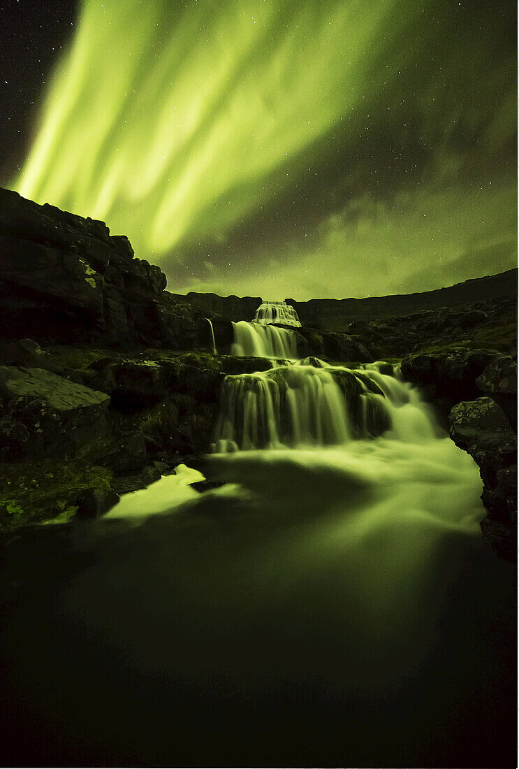 Northern Lights Over Dynjandi In The Westfjord Region Of Iceland, Dynjandi Is A Series Of Seven Waterfalls; Westfjords, Iceland