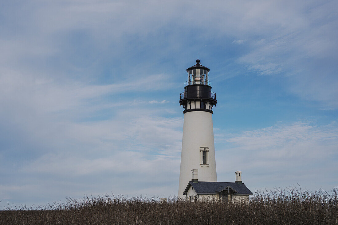 The Sky Clears Around Yaquina Head Lighthouse, Near Newport; Oregon, United States Of America