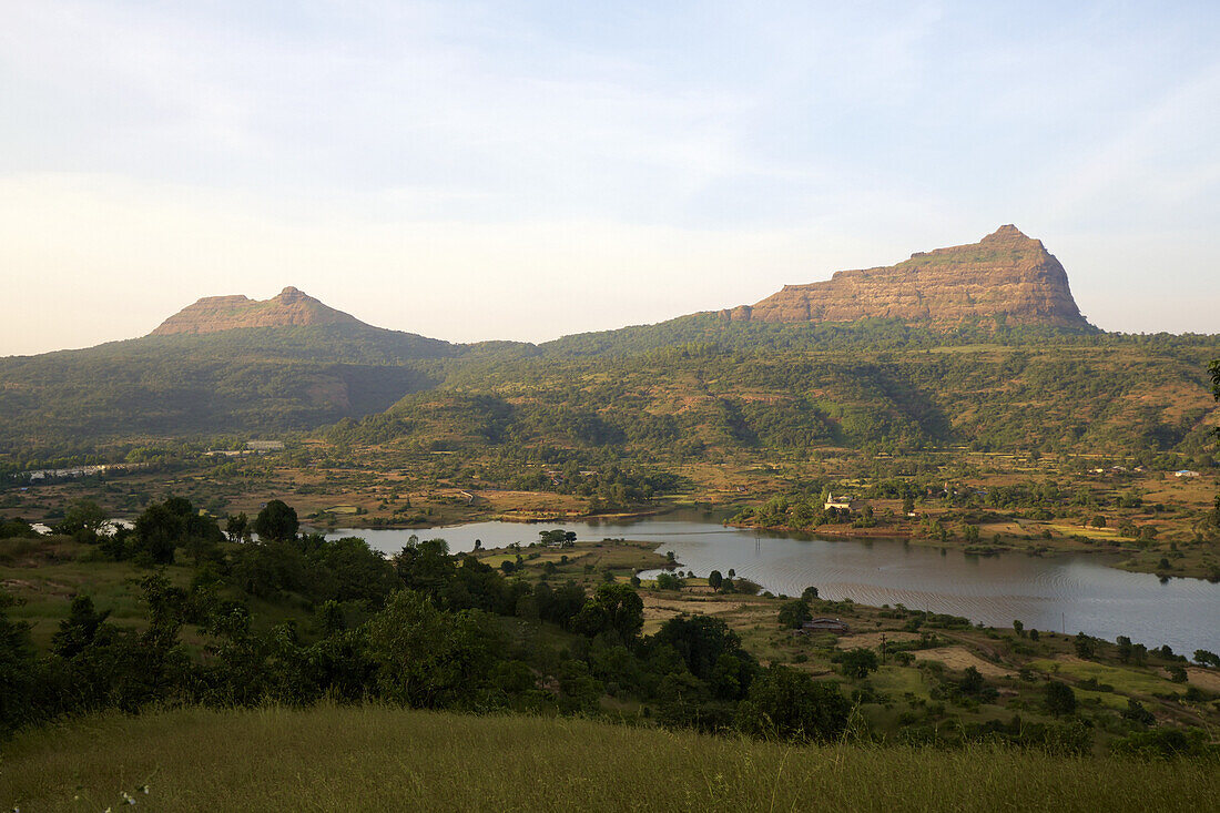 Western Ghats Landscape With Hills, Ruined Hill Forts And Lake
