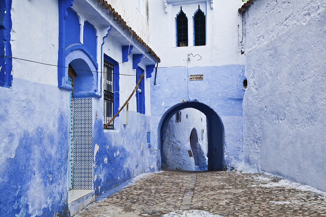 Blue Painted Buildings In The Backstreets Of Chefchaouen Medina; Chefchaouen, Morocco