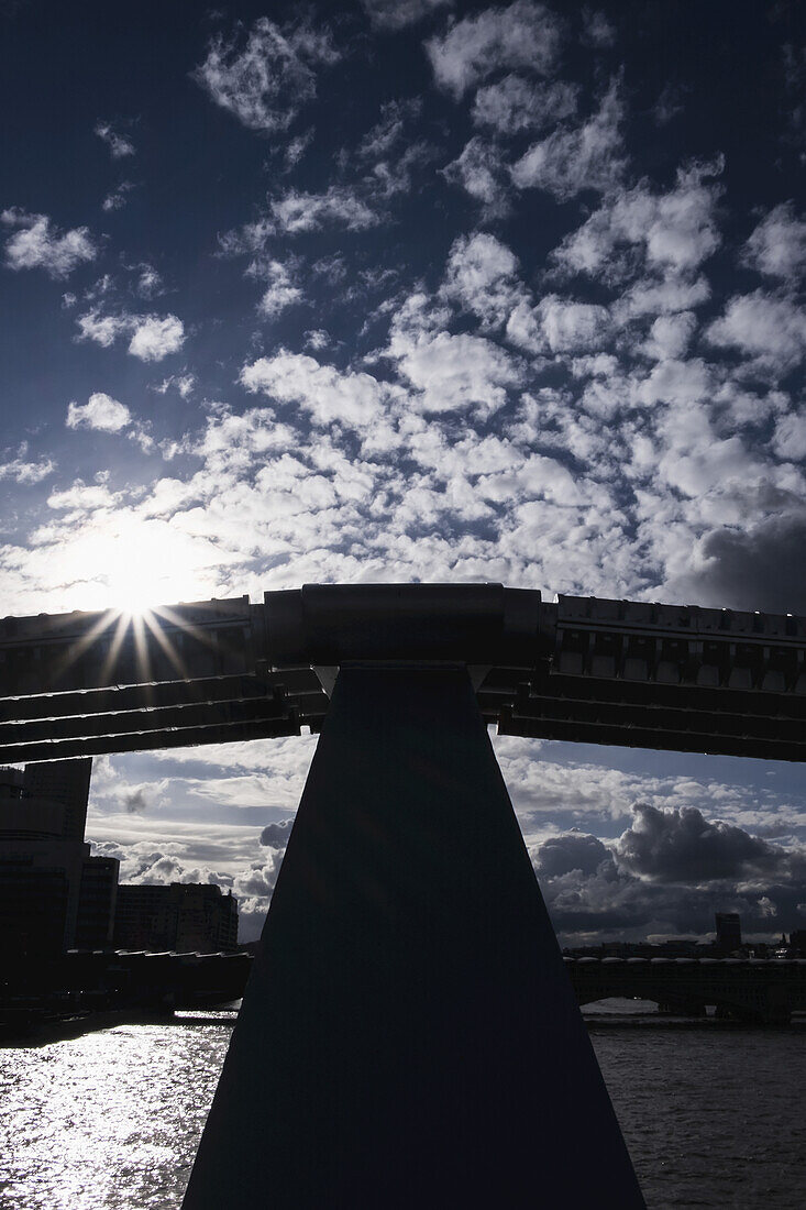 A Silhouetted View From Millennium Bridge Against A Dramatic Spring Sky; London, England