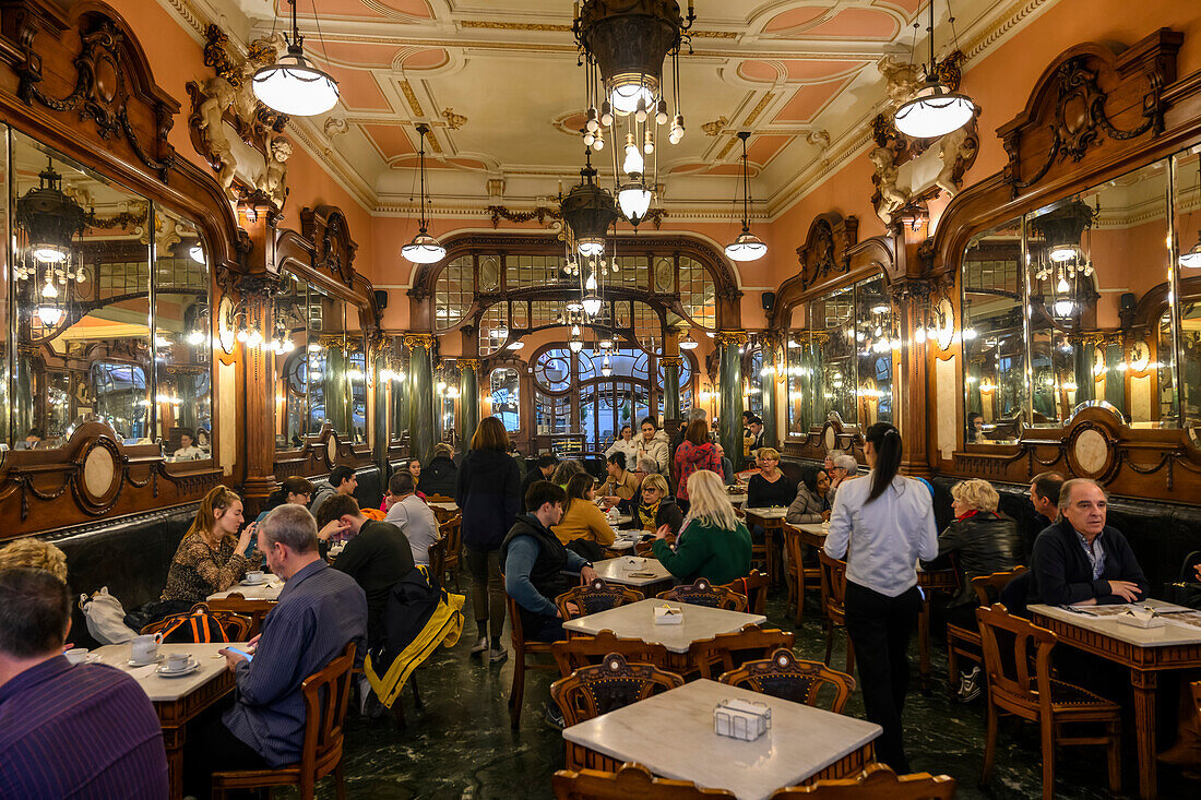 Customers dining in a restaurant; Porto, Portutal