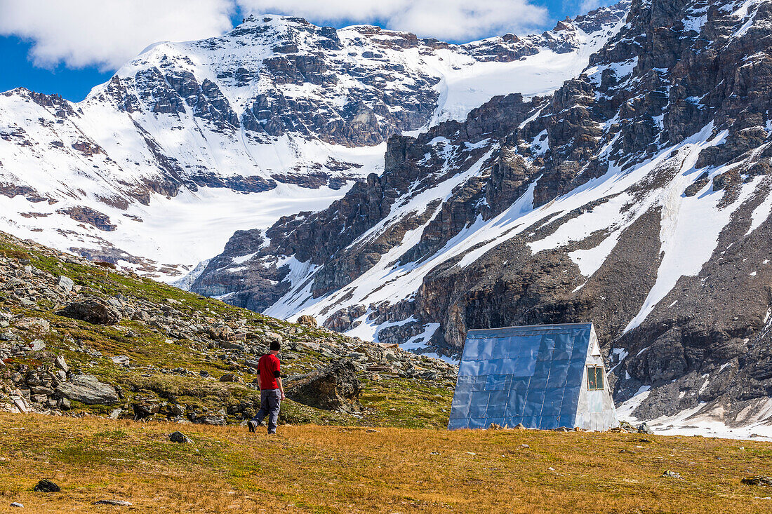 Thayer Hut, located in a remote area of the eastern Alaska Range beside Castner Glacier, has provided shelter for mountaineers and others since it was built in the 1960s; Alaska, United States of America