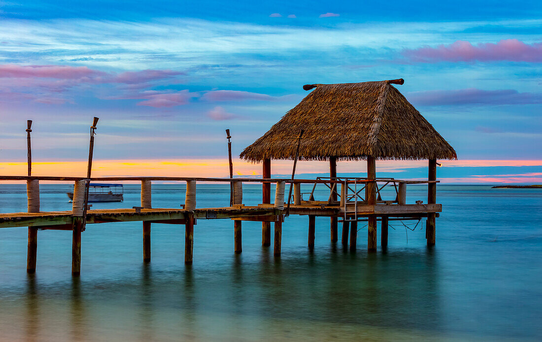 Pier off Malolo Island in the South Pacific at sunrise; Malolo Island, Fiji