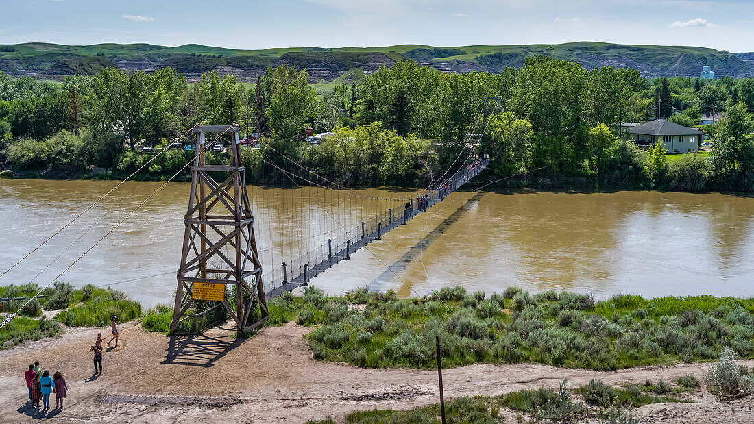 Star Mine Suspension Bridge, a 117 metre long pedestrian suspension bridge across the Red Deer River; Drumheller, Alberta, Canada